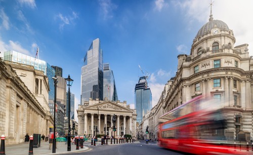 ong exposure view of the City of London with street traffic 