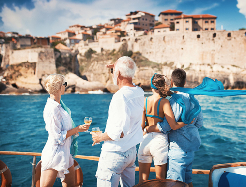 Family with drinks enjoying a boat trip