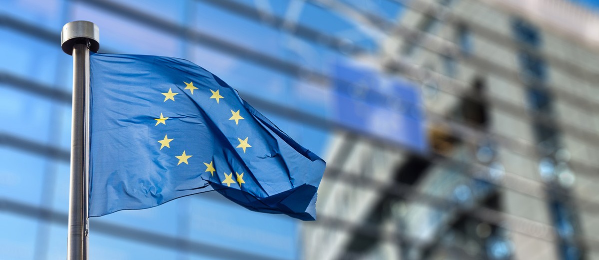European Union flag against European Parliament