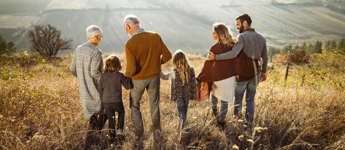 Family enjoying a sunny day on the fields