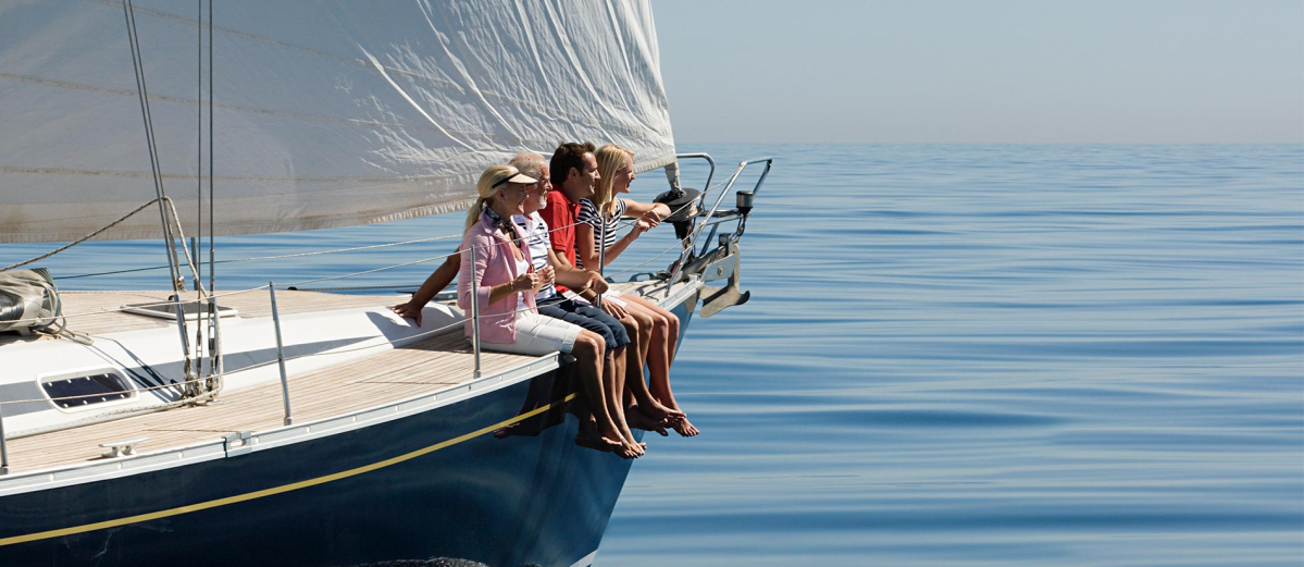 Family with drinks enjoying a boat trip