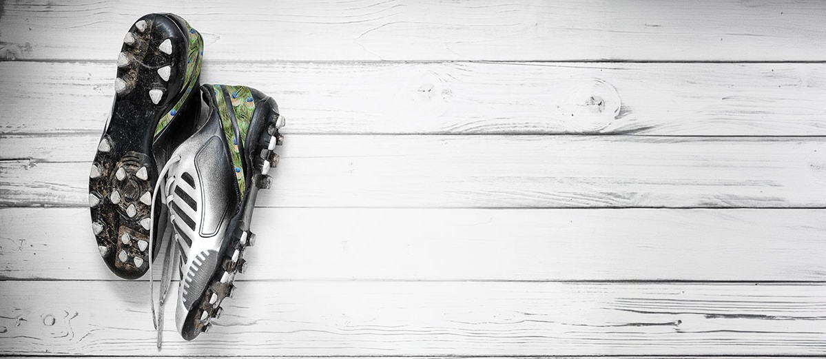 football boots hanging wall