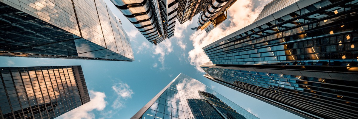 Looking directly up at the skyline of the financial district in central London 